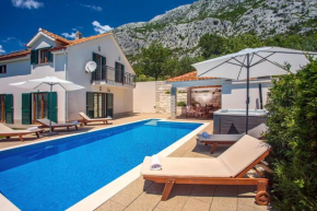 Villa Calma with heated pool,jacuzzi, Finnish sauna and 4 bedrooms